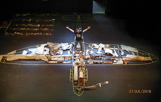 Spitfire flatlay: Ian Hewitt, CEO of expedition sponsors Spitfire Heritage Gin, with recovered parts pieced together in the Norweigan village theatre.